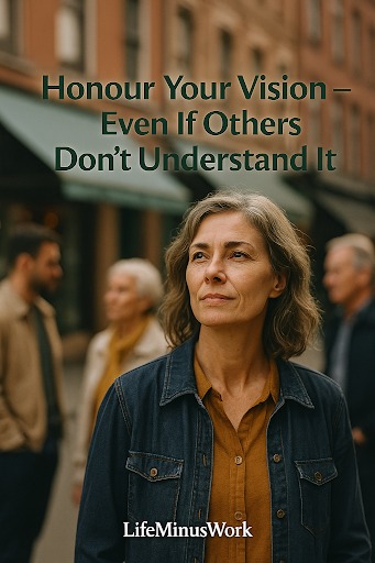 A middle-aged woman with shoulder-length, wavy grey hair and a denim jacket over a mustard-colored shirt stands in the foreground, looking thoughtfully up and to the right. She has a determined expression. Behind her, blurred, are other people and classic brick buildings, suggesting a city street. Overlaying the image, in a dark green font, are the words "Honour Your Vision – Even If Others Don't Understand It". The logo "LifeMinusWork" is at the bottom center.
